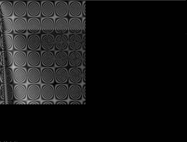 A grid of embossed grey circles, like a sheet of rivets